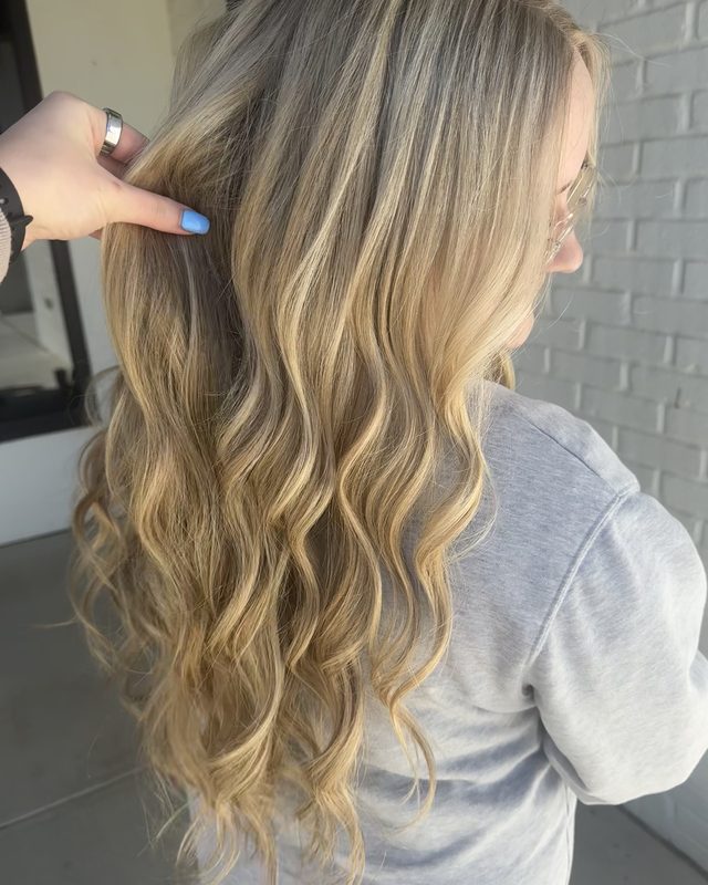 Blonde balayage with soft waves